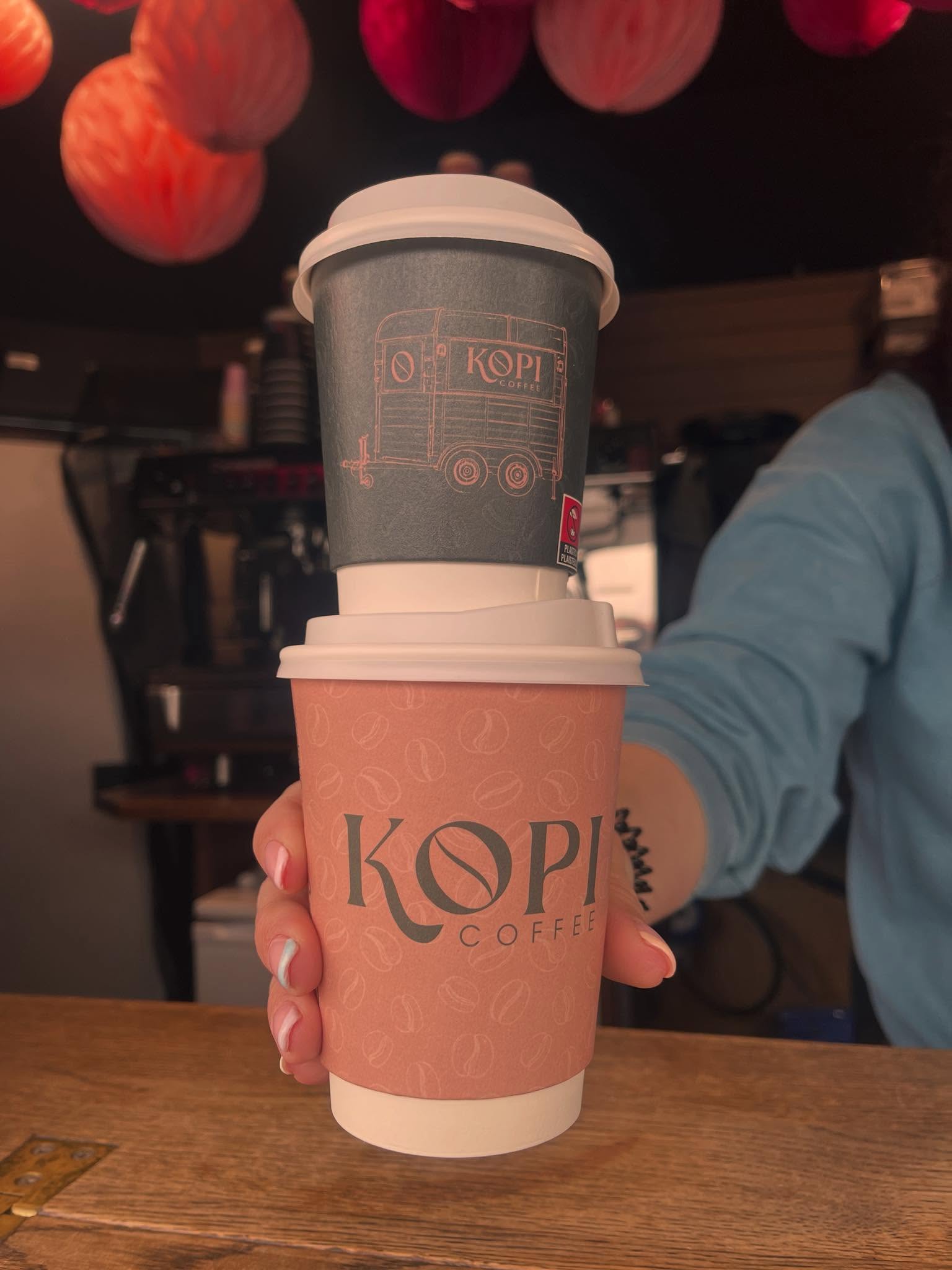 Two Kopi Coffee branded takeaway cups